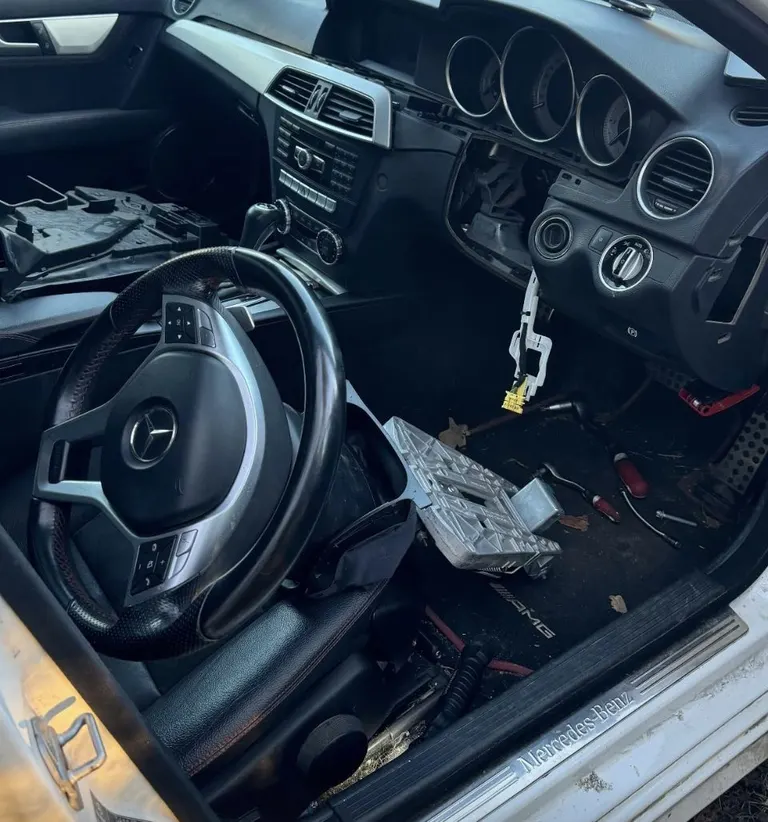 Mercedes C-Class 2012 with the steering column removed for an ESL repair